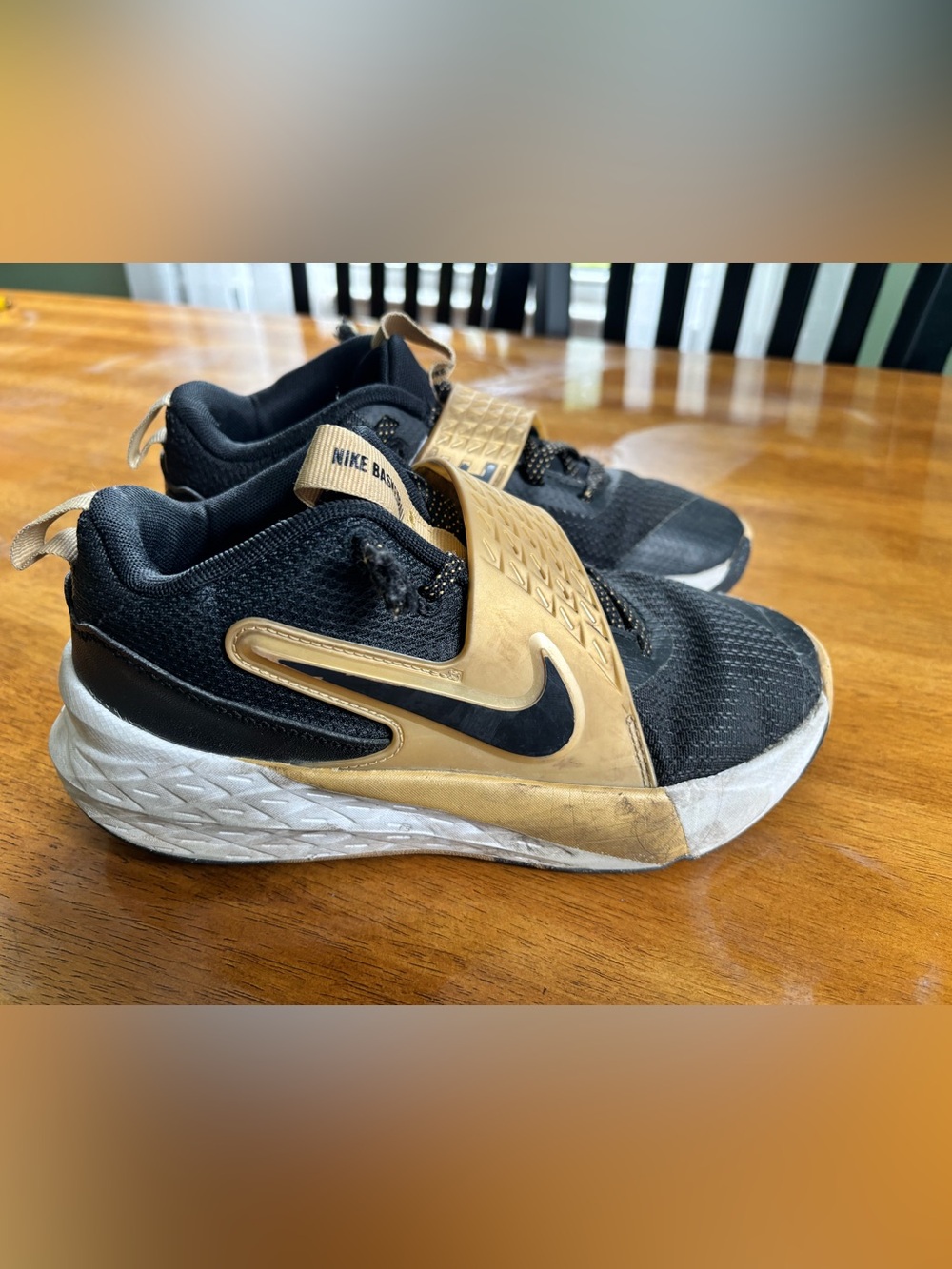 Boys 3.5 youth Nike Black and Gold Training Sneakers with Midfoot Strap